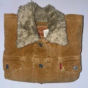 Tan Levi’s corduroy jacket with faux fur